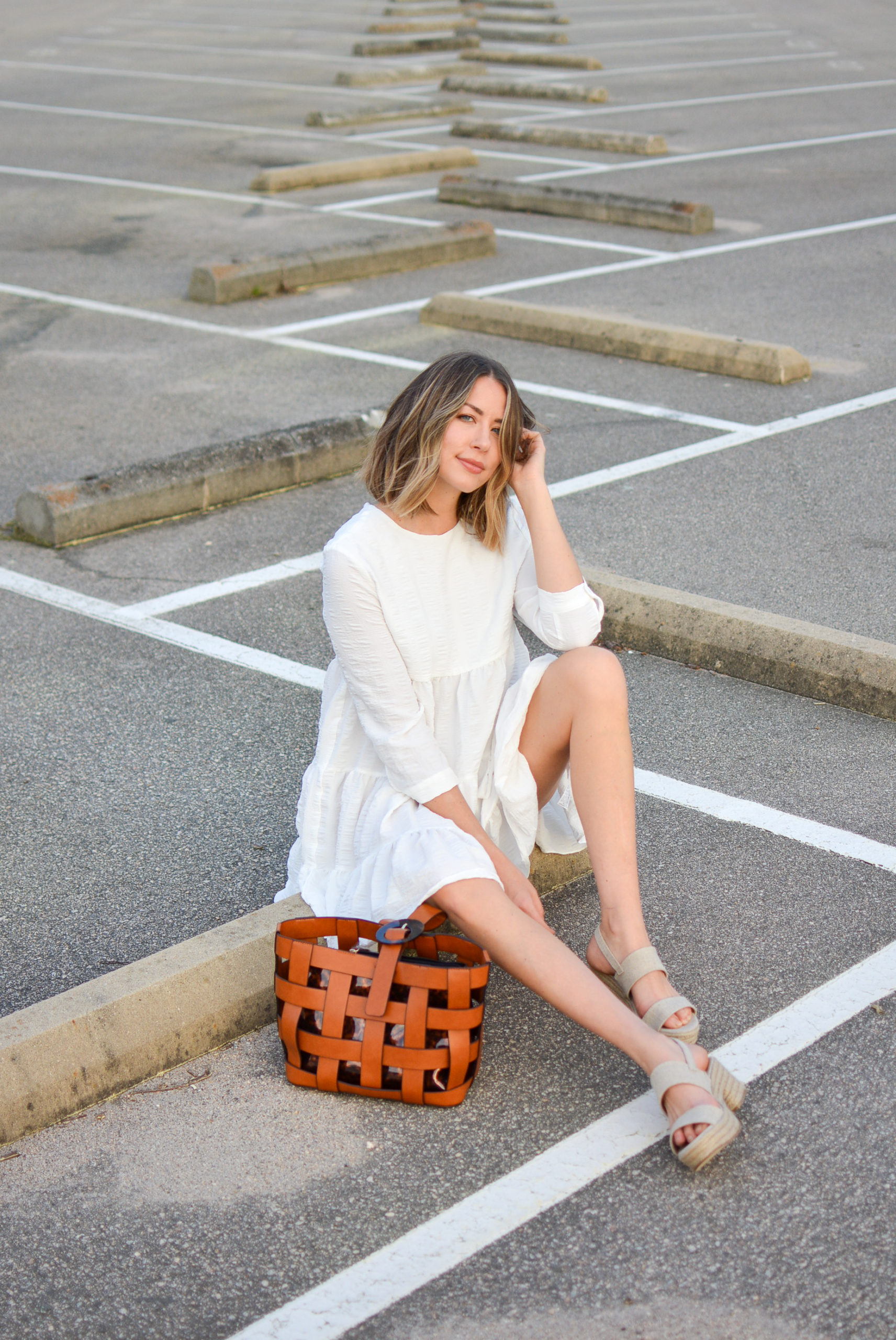 allie wears white puff sleeve dress